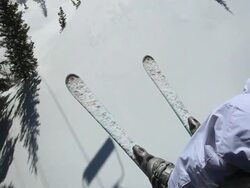 POV Skier riding chairlift over snow-covered slope / Alta, Utah, United States Stock Footage