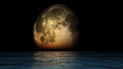 The moon moves through its phases on an ocean horizon. Stock Footage