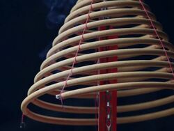 CU R/F Incense coils hanging in temple / Hong Kong, China Stock Footage