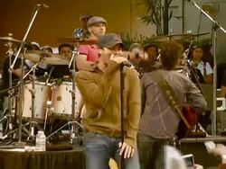 Enrique Iglesias Promotes Release of 'Insomniac' with Performance and Signing Stock Footage