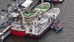 Aerials of Fishing for Leave and Vote Remain EU Referendum Campaign Boats on the River Thames News Clip