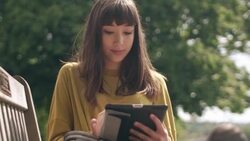 Bench girl tablet close Stock Footage