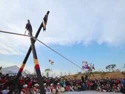 WS LA Shot of tightrope walker doing acrobatics on high wire / Gyeonggido, South Korea Stock Footage