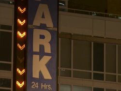 Parking garage sign with blinking neon arrows. Stock Footage