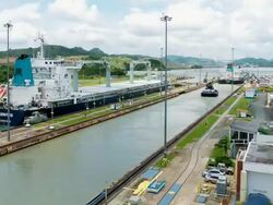 WS T/L View of ships crossing from Pacific to Atlantic ocean through Miraflores locks / Panama Stock Footage