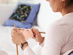 Woman at home knitting Stock Footage
