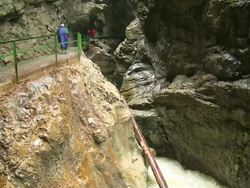 MS Tourist enjoying at canyon Breitachklamm near Allgau Alps / Oberstdorf, Bavaria, Germany Stock Footage