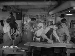 1952: ELKHORN HIGH SCHOOL ART SHOP: VS High school students in art shop painting Christmas decorations (for Nativity scene), male student painting Santa Claus display. Paint shop, Wisconsin, WI, education, arts, crafts, extracurricular, holidays Instructional Video