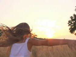HD SUPER SLOW-MOTION: Girl Running In Field At Sunset Stock Footage