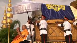 Mass outpouring of grief as late king's body returns to royal palace News Clip