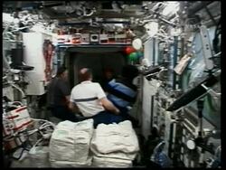 Space Shuttle Atlantis docks with ISS, astronauts meeting News Clip