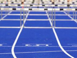 MS SLO MO Female Athletes in Hurdle Race Stock Footage