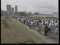 Thousands of anti-Gbagbo protesters march in capital News Clip