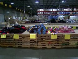 ATMOSPHERE - winter clothing at Local Volunteers in Carteret, NJ Help UNICEF & UPS Pack Winter for Syrian Children Stock Footage