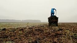 WA Farmer Spreading Manure Over The Field Stock Footage