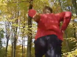 HD DOLLY SLOW MOTION: Runner Jumping Over Camera Stock Footage