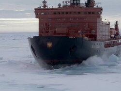 MS, Russian nuclear icebreaker traveling through frozen sea Russia Stock Footage