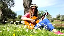 Young woman with guitar Stock Footage