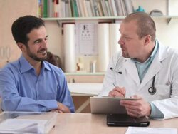 HD DOLLY: Doctor Interviewing A Patient Stock Footage