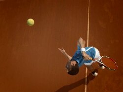 HD Super Slow-Mo: Tennis Player Serving On The Clay Court Stock Footage