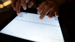 Woman typing a tablet Stock Footage