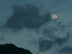 The clouds are flowing and the moon is disappearing Stock Footage