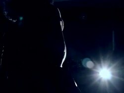 MS Shot of silhouette of young man playing bass guitar / Shinjuku, Tokyo, Japan Stock Footage