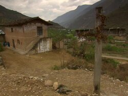 "Stone cross with villiage behind, mountain range and valley visible, rural Amazonas region of Peru [PerÃƒÂº]" Stock Footage