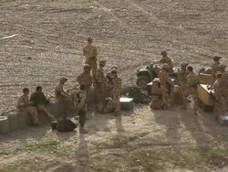 WS Soldiers discussing in landscape / Musa Qala, Helmand Province, Afghanistan. Stock Footage