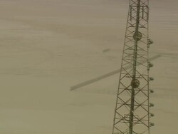 MS AERIAL TS Shot of top part of mobile tower in front of highway / Qatar Stock Footage