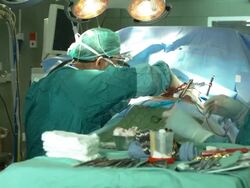 Two surgeons operating patient's heart Stock Footage