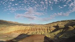 High altitude aerial of Painted Hills Stock Footage