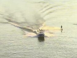 WS AERIAL TS View of person riding wakeboard on the Tennessee River at Chattanooga, TN / Chattanooga, Tennessee, United States Stock Footage