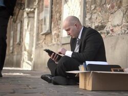 HD DOLLY: Businessman Using Digital Tablet On Street Stock Footage