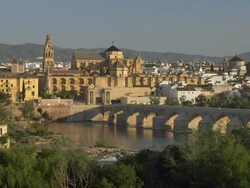 MS Roman bridge, Guadalquivir river and Cathedral-Mosque on left Stock Footage