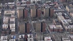 Aerial view of Harlem public housing. The Drew Hamilton Houses are a group of five 21-story buildings housing close to three thousand residents in the Harlem neighborhood of New York City. Stock Footage