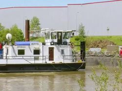 WS Shot of Tug boat approaching towards harbor, deconstruction of bridge over river Mosel / Wellen, Rhineland Palatinate, Germany Stock Footage
