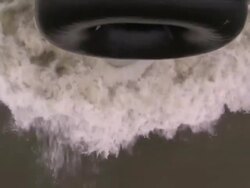 A barge with a rubber tube pushes across the Hudson River. Stock Footage