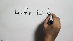 Hand writing a 'life is too Short' message on a white board using a black marker Stock Footage