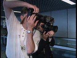 UK: LONDON: AMERICAN FREED FROM IRAQI JAIL MAKES JOURNEY HOME News Clip