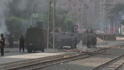 Security forces fire tear gas, move barricades as they attempt to clear sit-in protests News Clip