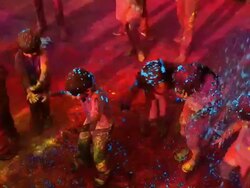 Group of children playing holi and dancing, Delhi, India Stock Footage