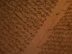 Pan left across Arabic manuscripts, Egypt (sound available) Stock Footage