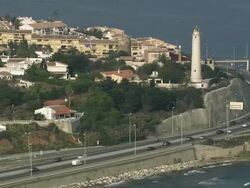 WS ZI ZO POV AERIAL Lighthouse at Punta de Calaburra / Fuengirola, Andalusia, Spain Stock Footage