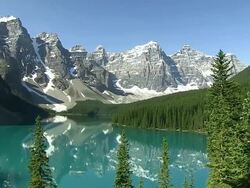 WS PAN View of Moraine Lake in ten peaks valley at nationalpark / Lake Louise, Alberta, Canada Stock Footage