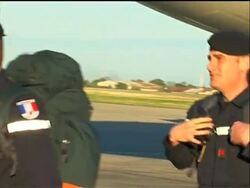 French rescue team arrives to help search for quake survivors News Clip