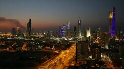 Kuwait, Kuwait City, elevated view over the modern city skyline at dusk Stock Footage