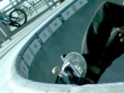 CU SLO MO Shot of skateboarder doing nose grab to tail slide / Venice, California, United States Stock Footage