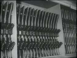 Federal Bureau of Investigation trainees learn about guns at the Academy Gun Vault. News Clip