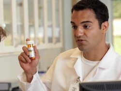 "PAN hispanic pharmacist consulting about prescription in pharmacy/Richmond,Virginia, USA" Stock Footage
